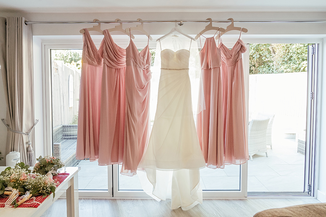 Dusky Pink Bridesmaid Dresses and Wedding Dresses Hang