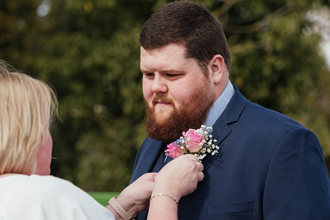 Groom has buttonhole Langtons House Hornchurch Venue