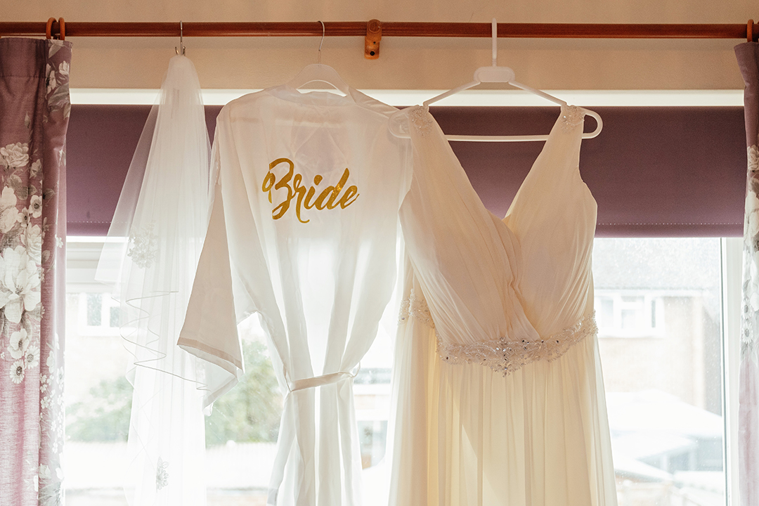 Bride Dressing Grown Hanging With Dress