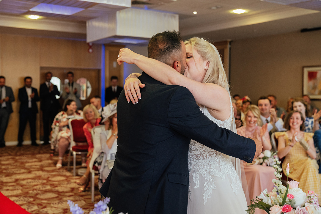 Couples First Kiss Marks Tey Hotel Wedding Ceremony