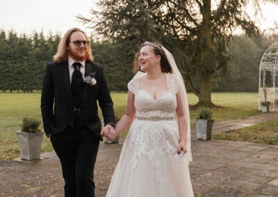 059 Wedding Moments 2022 - Couple Walk Manor of Groves Wedding