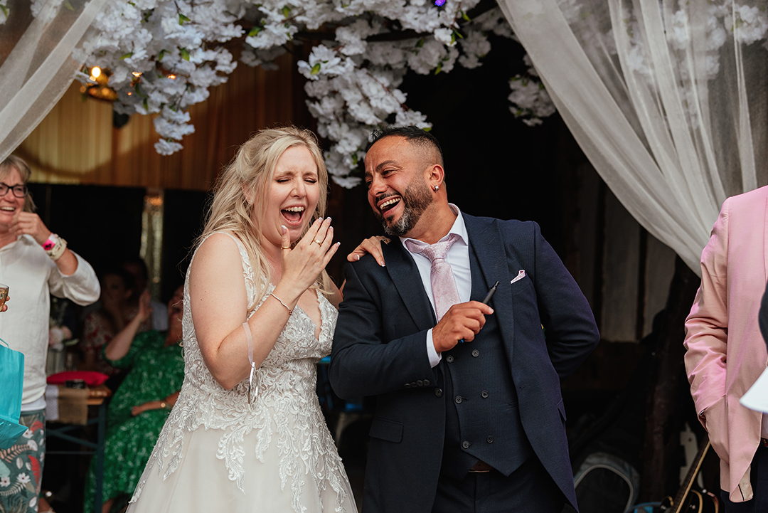 Bride and grooms reactions to Speeches Stock Street Farm Barn Wedding Photography