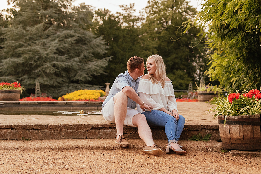 Couple Sitting together on step at Hylands Park