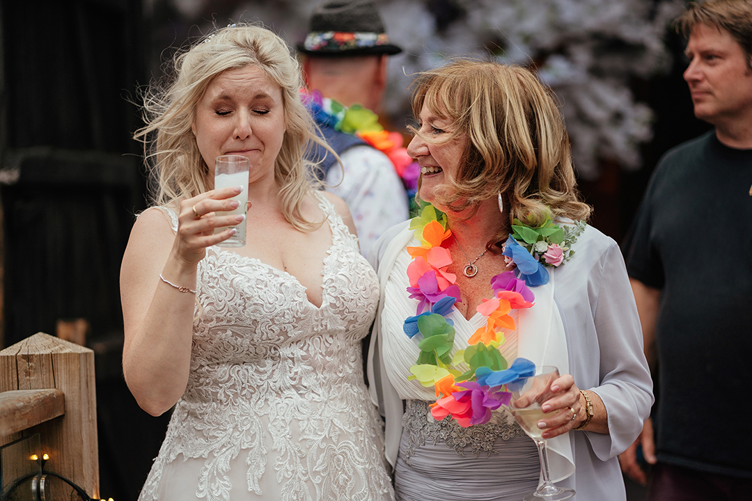 Bride reaction to strong Drink Stock Street Farm Barn Wedding Photography