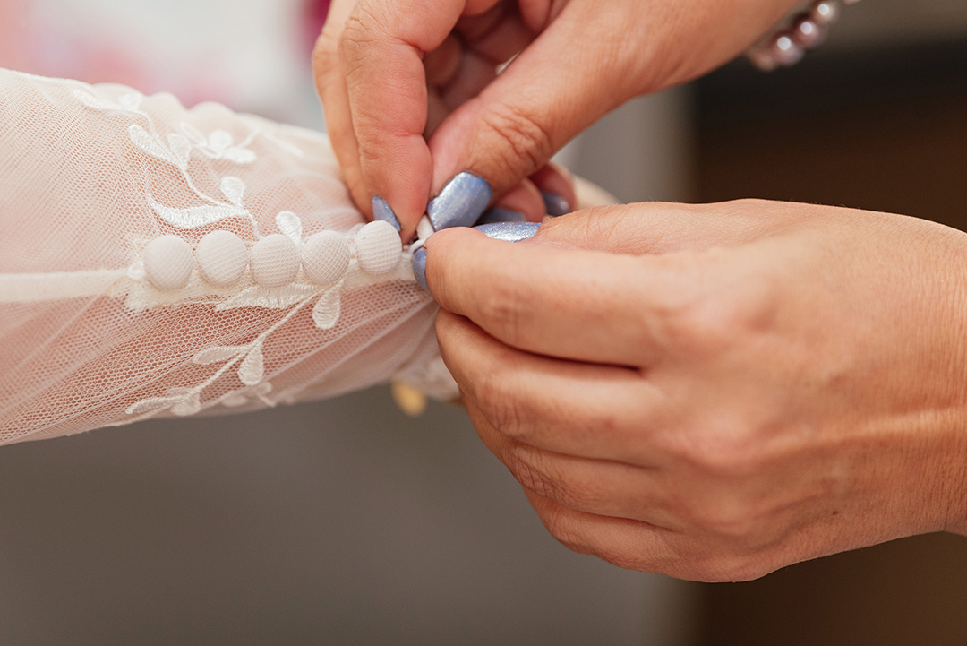 Close Up Mum Does Brides Sleeve buttons Up Minstrel Court Wedding Photography