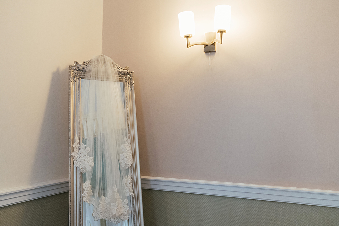 Veil Hanging on Mirror at Manor of Groves Wedding