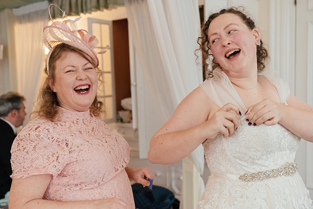 Mum and Daughter Laugh Manor of Groves Wedding