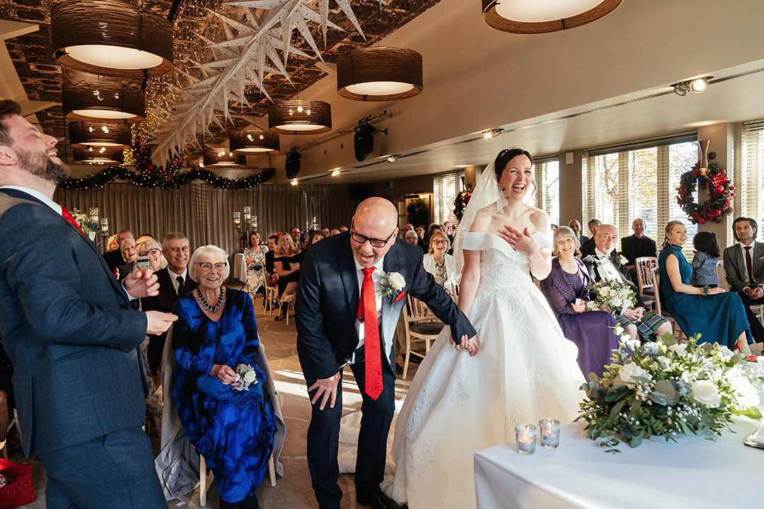 Groom Slaps Knee and Belly Laughs The Lion House Wedding Photography