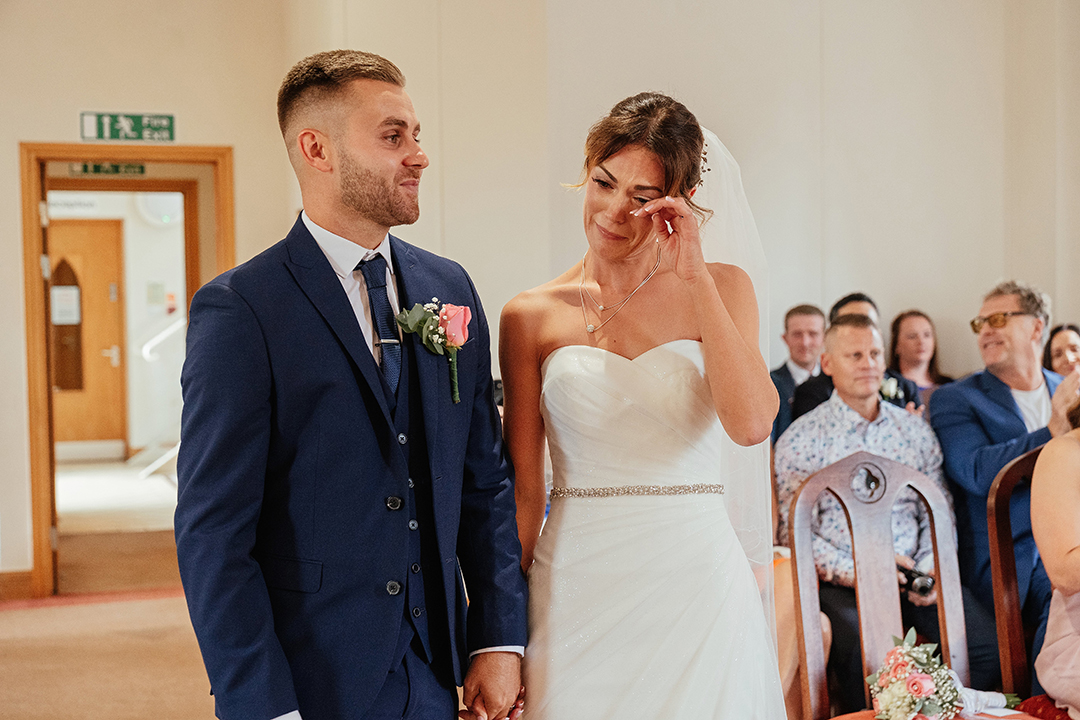 Bride Wiping Tear During St Albans Registry Office Wedding Ceremony