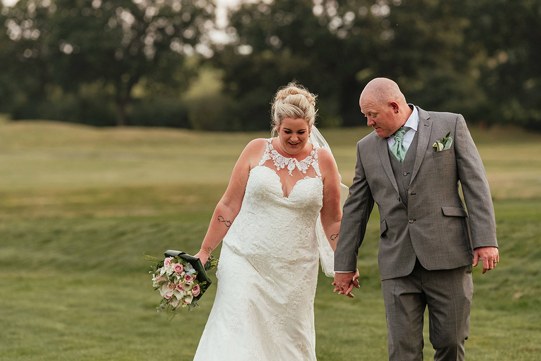 Couple Walk Along the Course in The Rayleigh Club Wedding Photography Couples Session