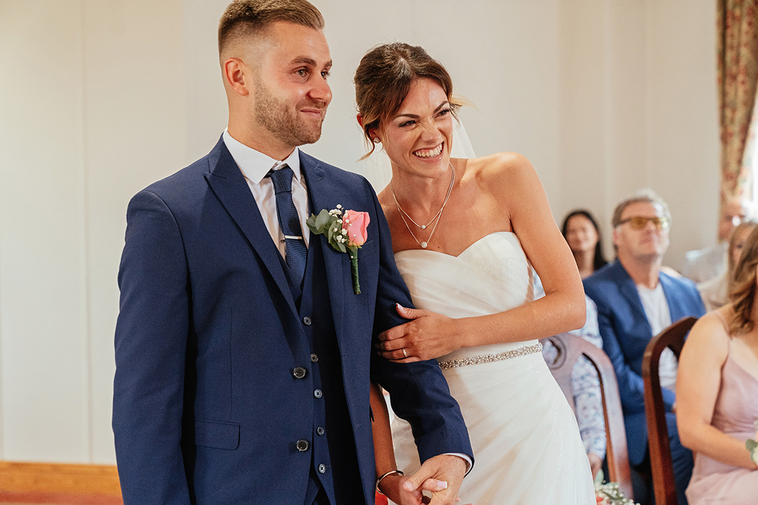 Couple Embrace Smiling St Albans Registry Office Wedding Ceremony