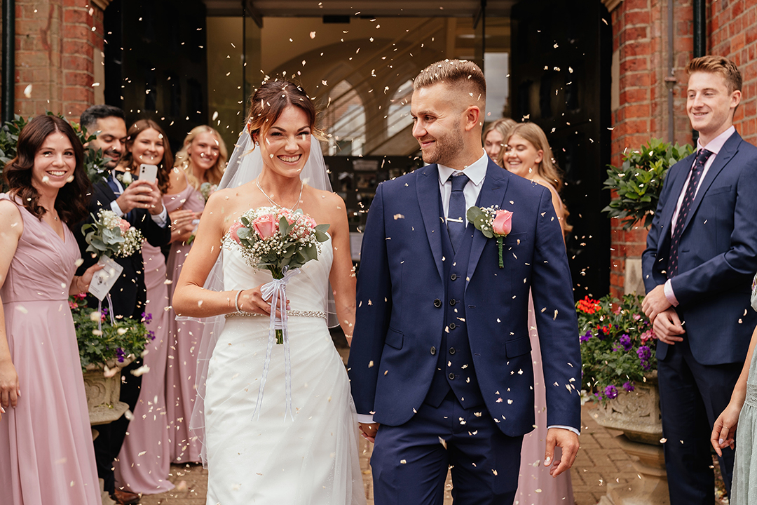 Couple Walk Through Confetti St Albans Registry Office Wedding Photography