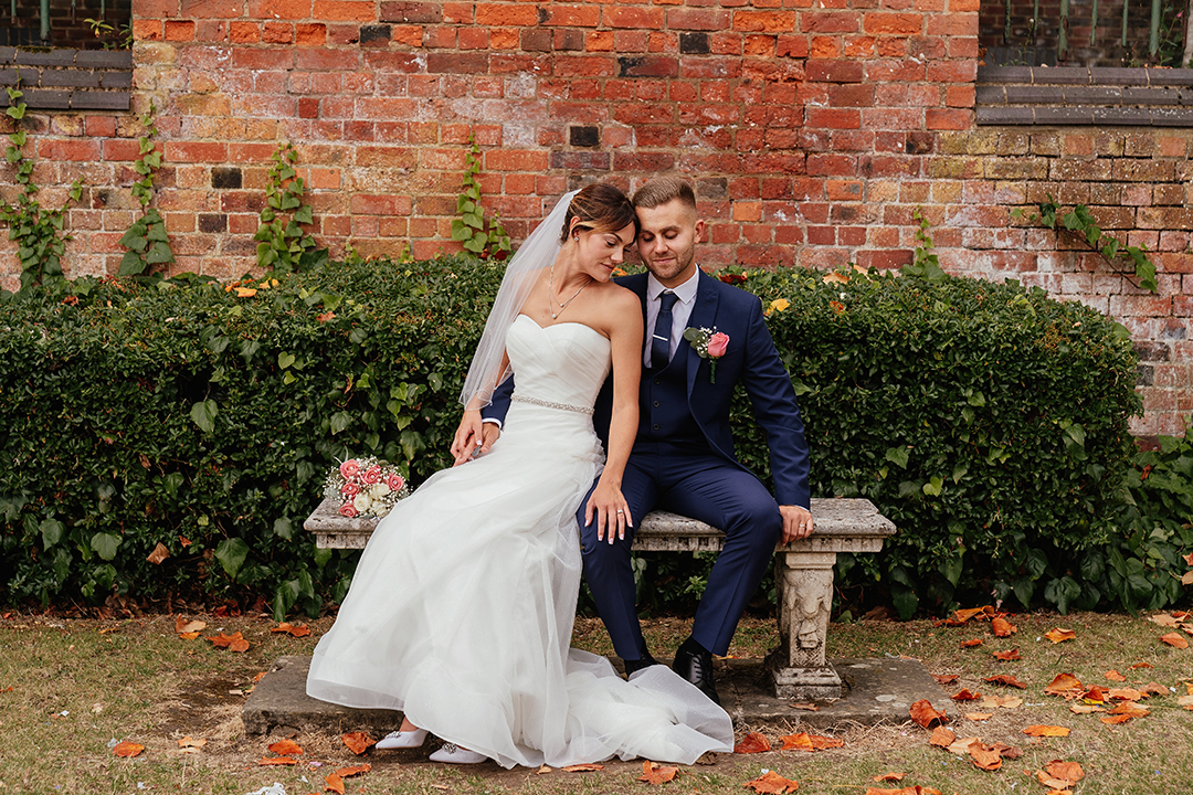 Couple Embrace Bench St Albans Registry Office Wedding Photography
