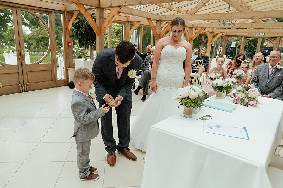 Son Gives Rings Gaynes Park Wedding Ceremony