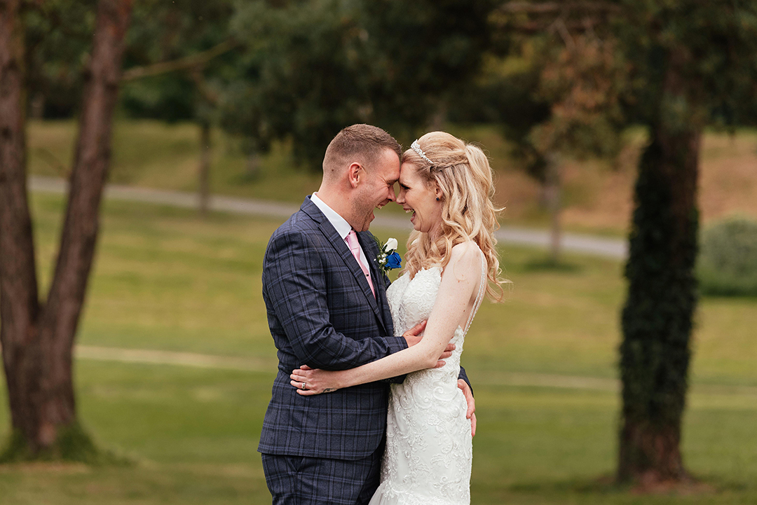 Couple Embrace Laughing Canons Brook Golf Club Wedding
