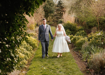 Couple Walk towards camera That Amazing Place Wedding Photography