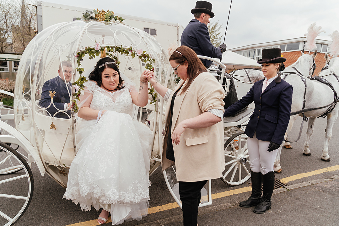 Bride being Helped Out of the Ostlers Horse Carriage
