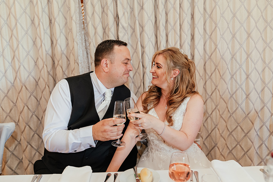 Couple Cheers in Cute Moment Vaulty Manor Wedding Photography