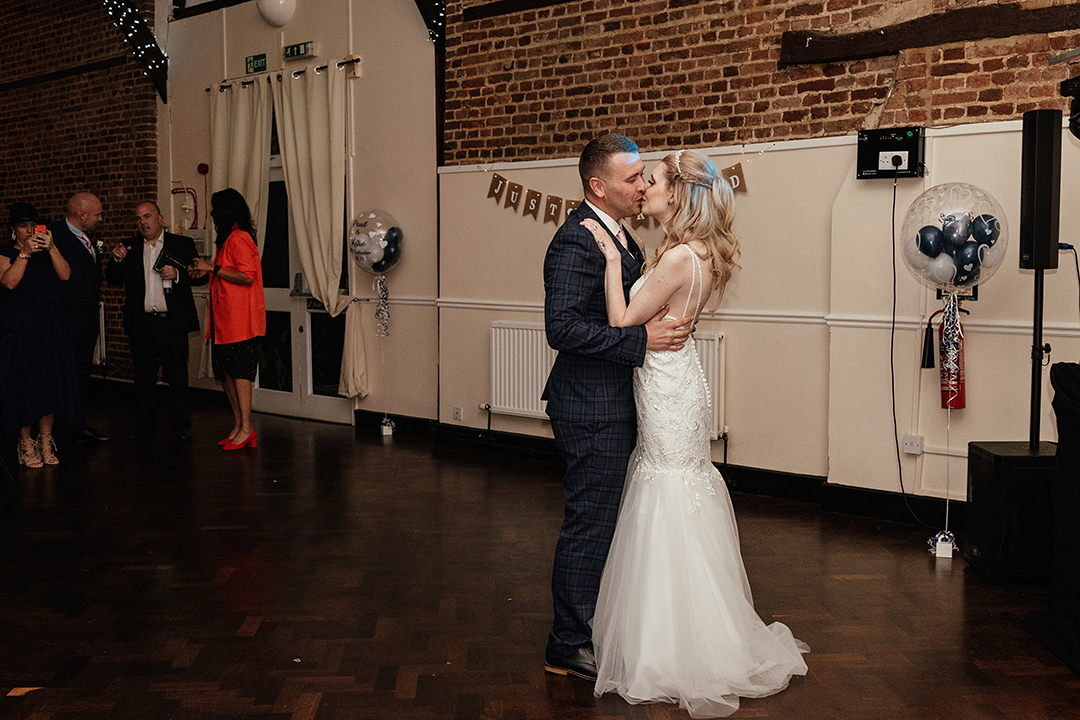 Couple Kiss During First Dance Canons Brook Wedding