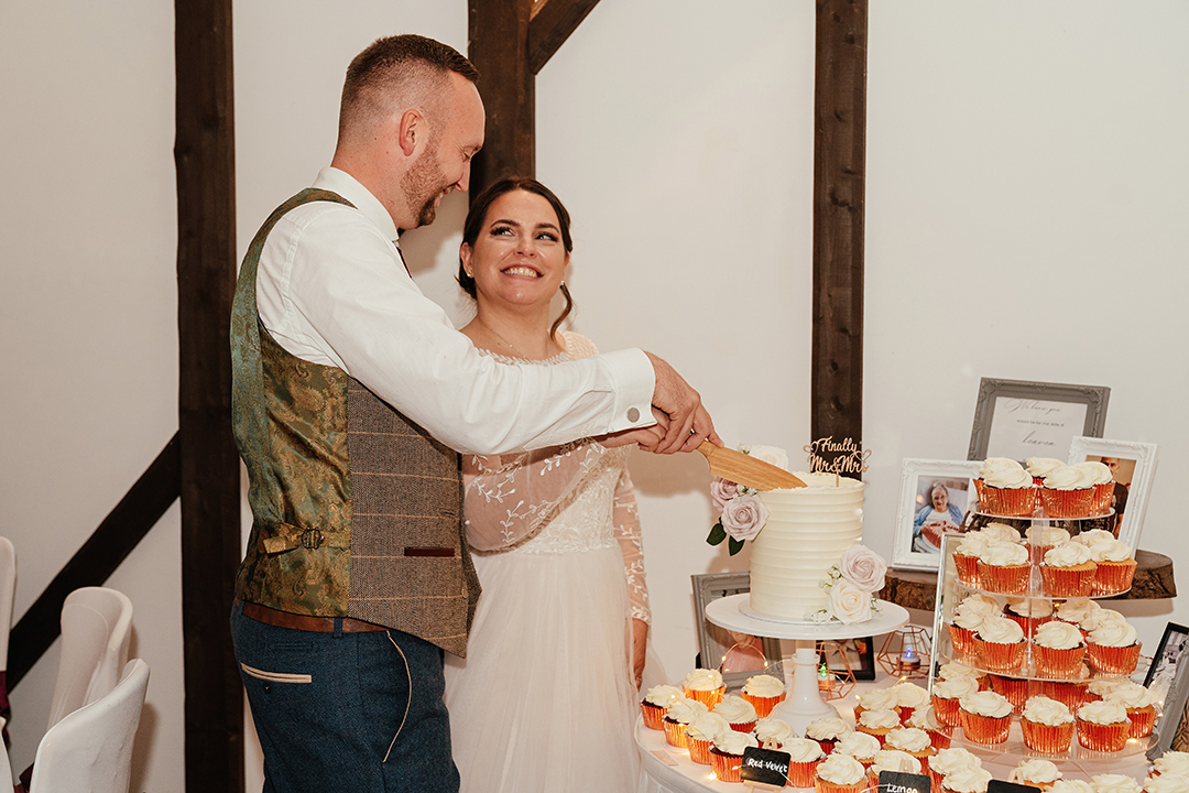 Couple Cut Cake Minstrel Court Wedding Photography