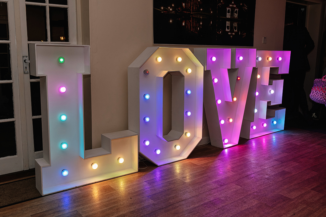 Multicoloured Love Lights Minstreal Court Wedding Reception