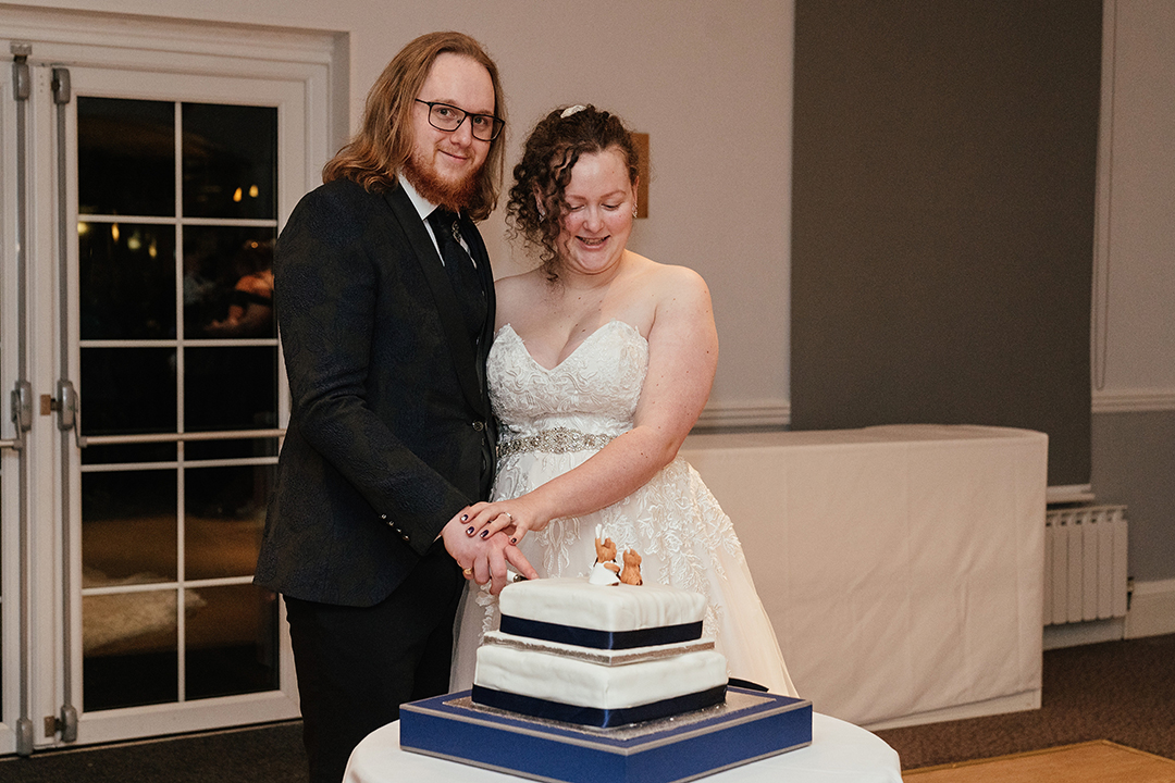 Cutting Cake Manor of Groves Wedding