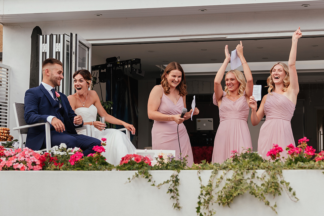 Three Bridesmaids Celebrate while Given Joint Speech