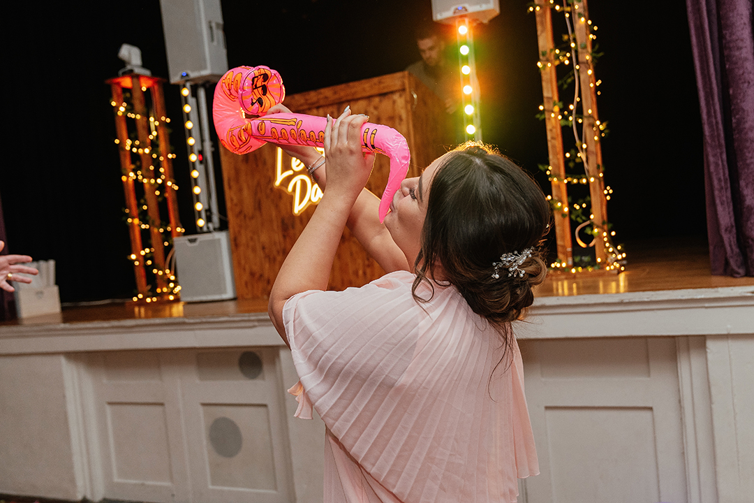 Fun Shot of Bridesmaid on Dancefloor