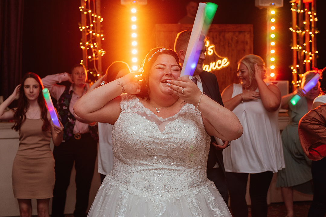 Bride Dancing with Light up Foam Tube Sawbridgeworth Memorial Hall Wedding