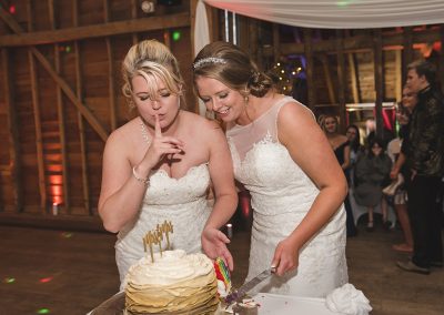 Bride signals to shh don't tell anyone we dropped some cake!