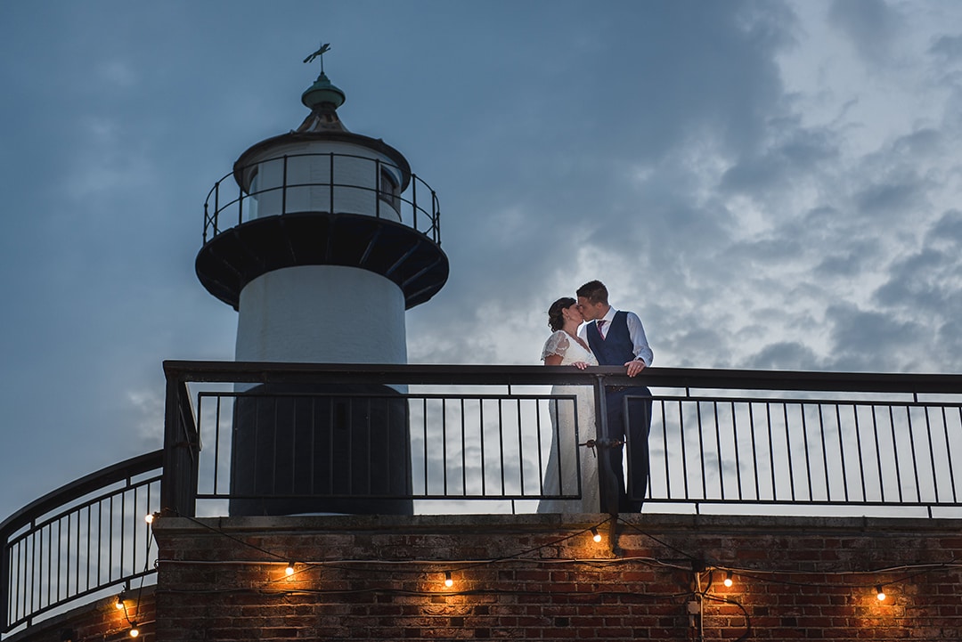 Couples Portrait with Lighthouse at Southsea Castle in background