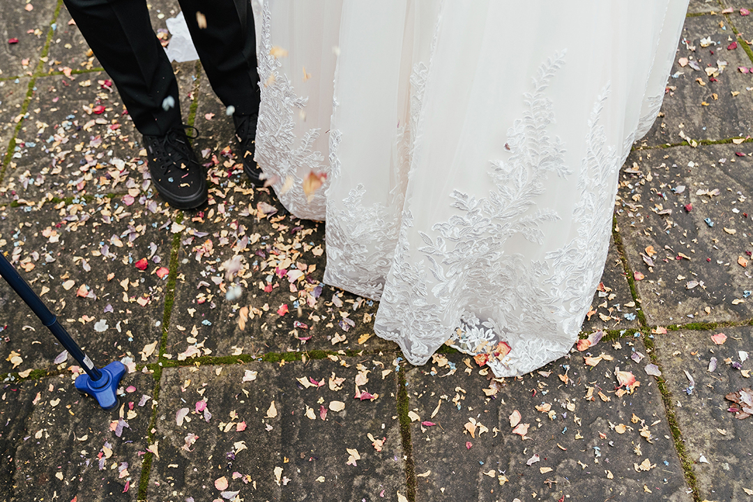 Storytelling wedding photography confetti on floor