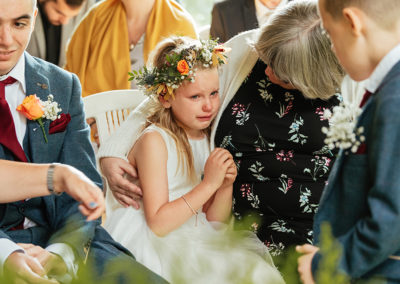 Girl cries during wedding ceremony
