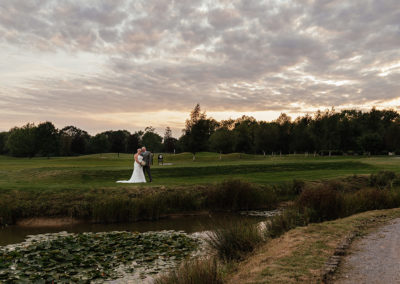 Couple at sunset on the course at the Rayleigh Club
