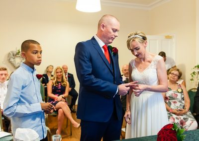 Exchanging rings at Harlow Wedding ceremony at the moot house